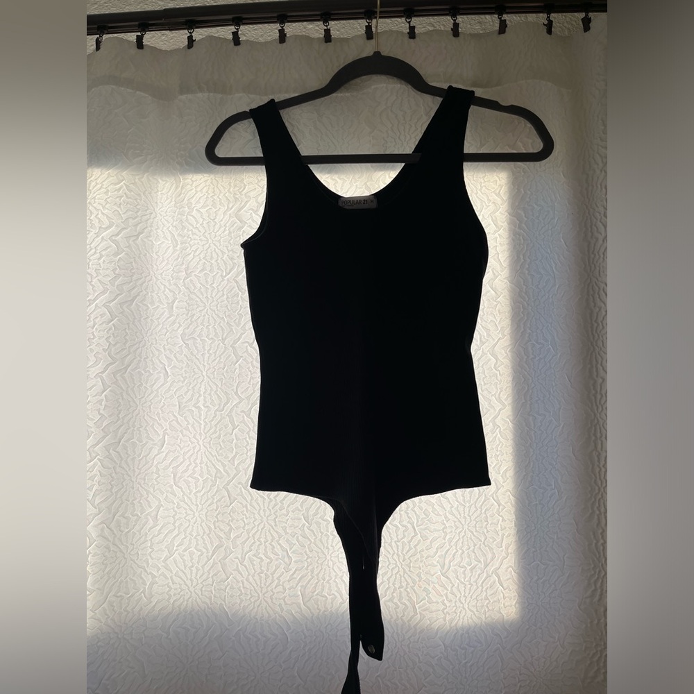 Black ribbed body suit